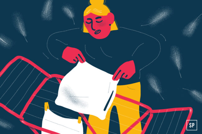 Illustration einer Person mit roter Haut und gelben Haaren und Hosen, die weiße Wäsche auf einem roten Wäscheständer vor einem dunkelblauen Hintergrund aufhängt und sich auf ihre Aufgabe konzentriert - vielleicht sogar darüber nachdenkt, wie man richtig Kopfkissen wäscht.