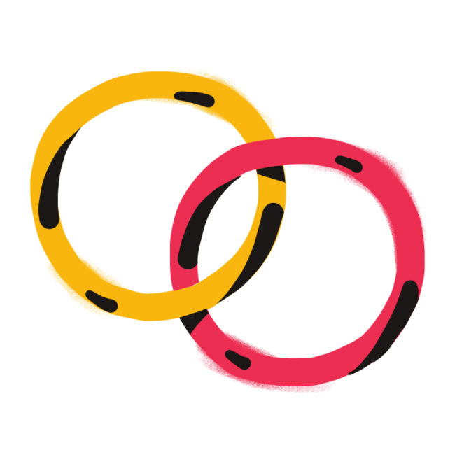 Zwei ineinander greifende Ringe, ein gelber und ein roter, mit jeweils mehreren schwarzen Markierungen auf der Oberfläche, auf weißem Hintergrund.