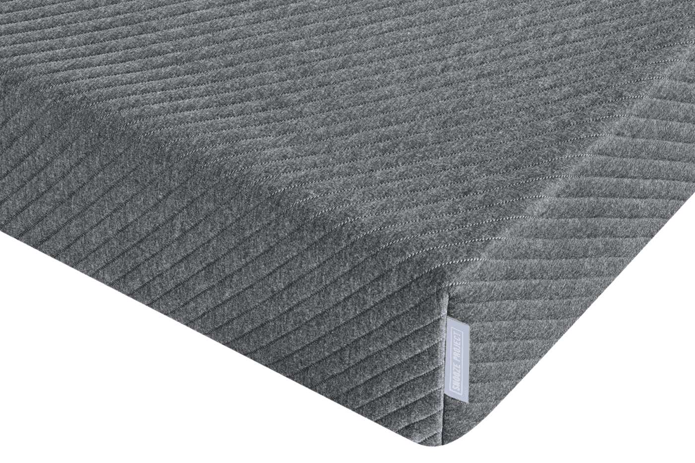 Nahaufnahme einer rechteckigen, grauen Memory-Foam-Matratze mit einem strukturierten, diagonal gestreiften Stoffbezug und einem kleinen Stoffetikett an der Seite - Perfekt für Matratzen nach Maß aus unserem Konfigurator.