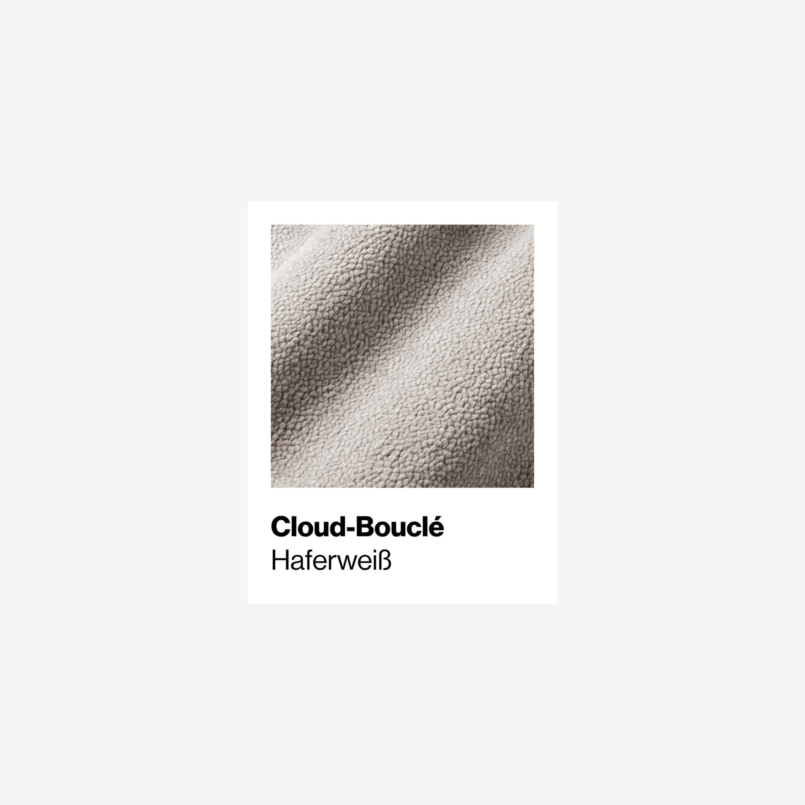 Eine Nahaufnahme des weichen, strukturierten Cloud-Bouclé-Stoffes in hellem Haferweiß, beschriftet mit Cloud-Bouclé Haferweiß auf einem sauberen weißen Hintergrund.