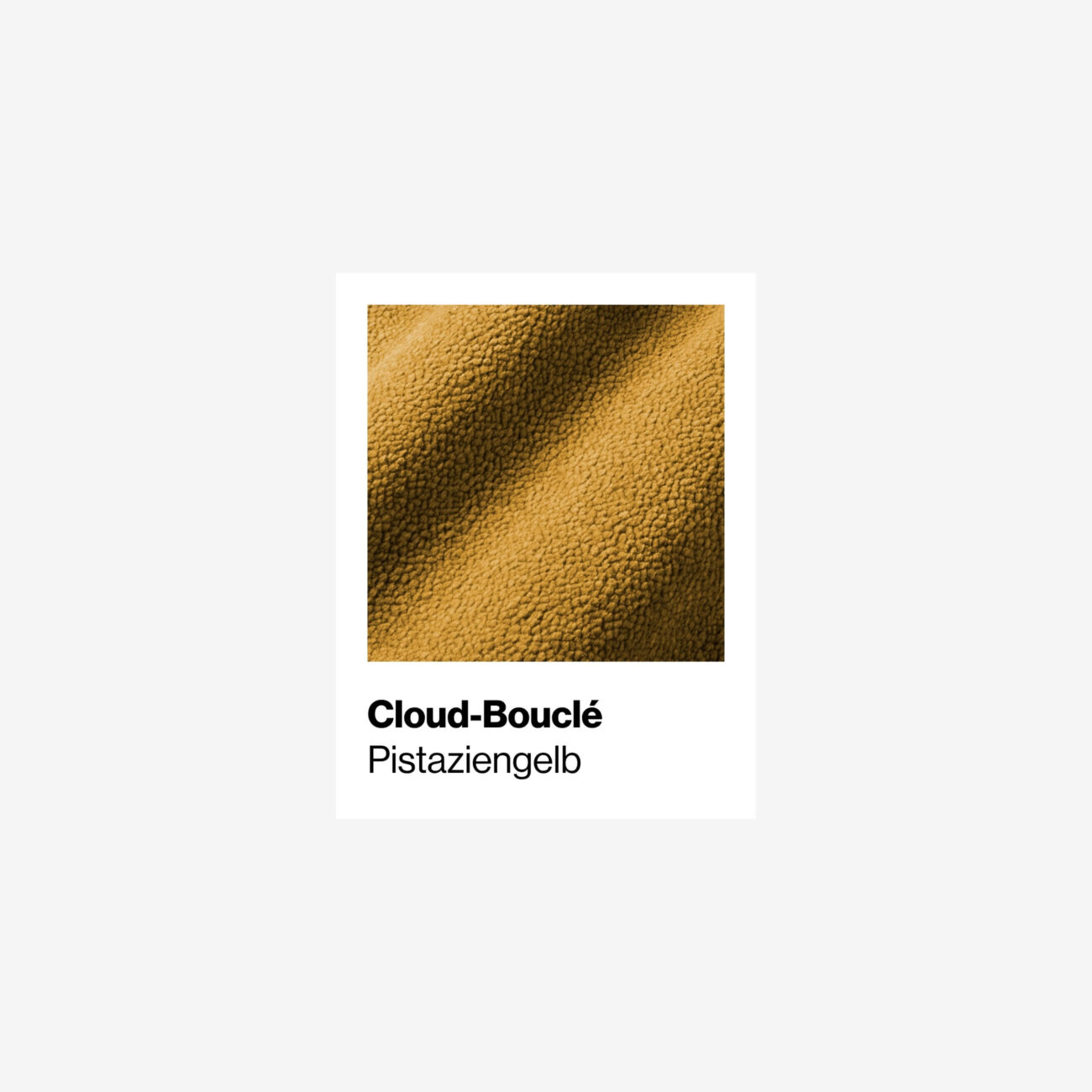 Muster-CB-PG Nahaufnahme eines strukturierten gelb-grünen Stoffes mit der Aufschrift Cloud-Bouclé Pistaziengelb auf weißem Hintergrund.
