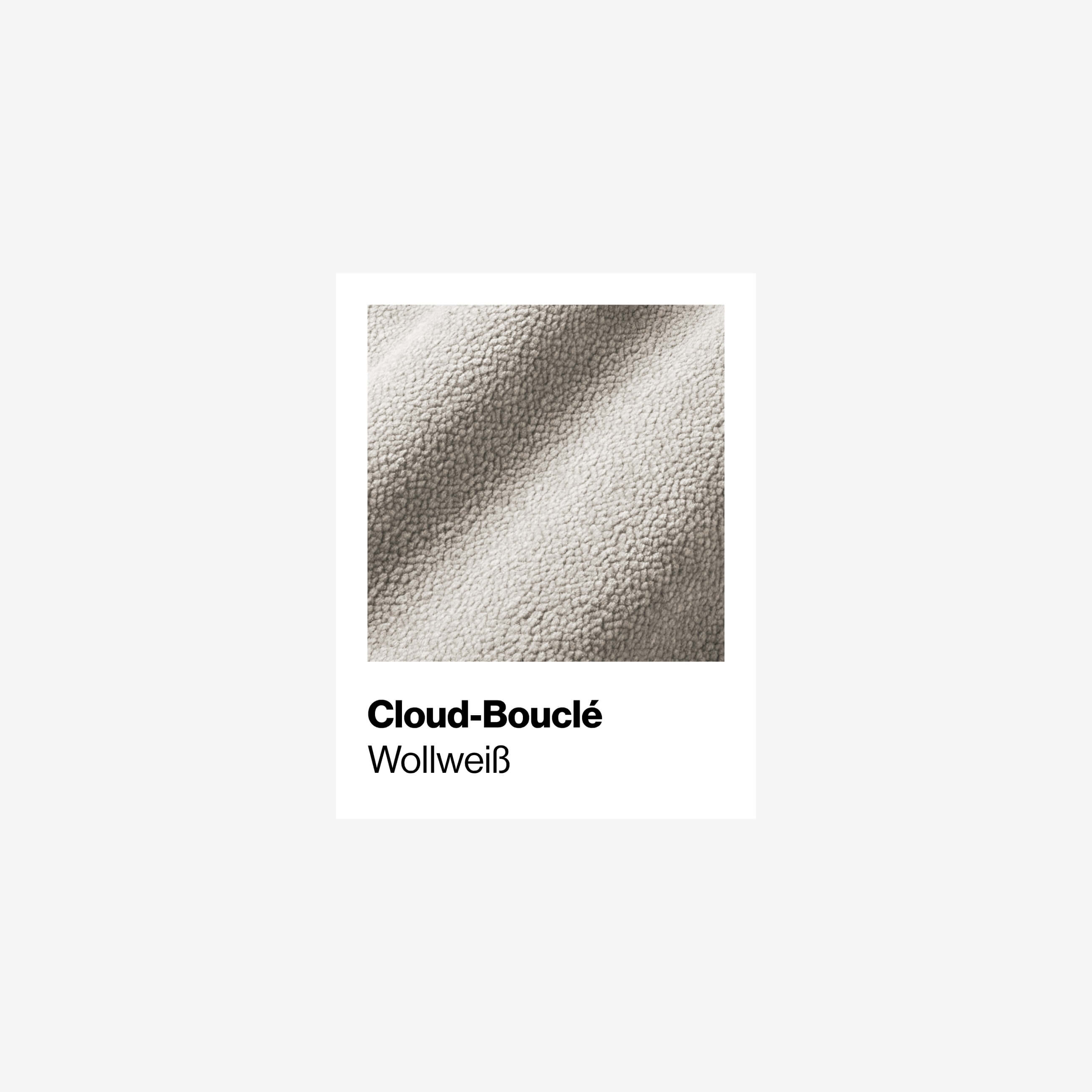 Eine Nahaufnahme eines hellbeigen, strukturierten Cloud-Bouclé-Stoffes mit der Aufschrift Wollweiß auf weißem Hintergrund. Der Text ist in fetter und regelmäßiger Schrift unterhalb des Stoffbildes angebracht.