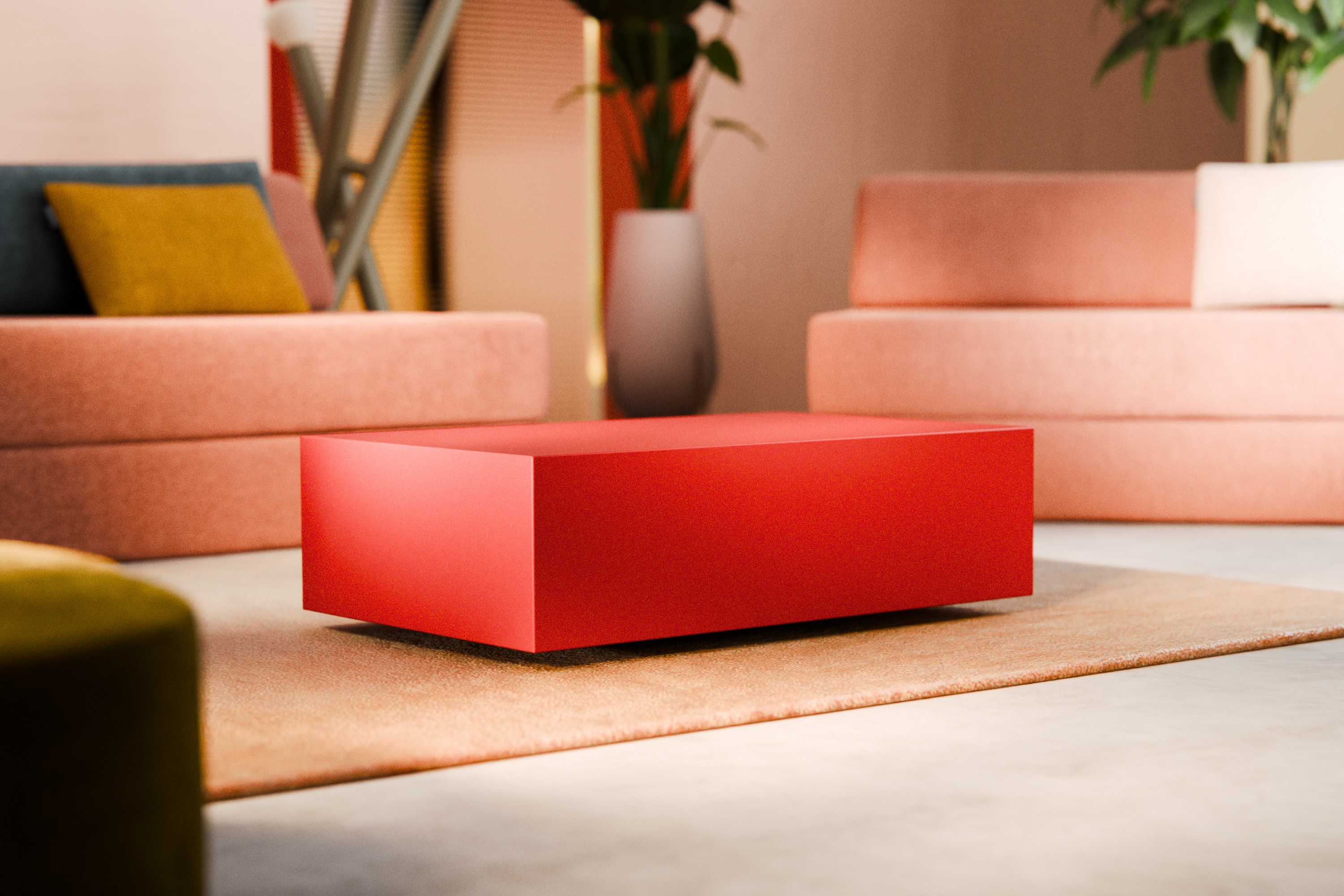 Ein modernes Wohnzimmer mit einem auffälligen roten, rechteckigen Couchtisch auf einem beigen Teppich, umgeben von rosa Sofas, bunten Kissen und Topfpflanzen im Hintergrund.